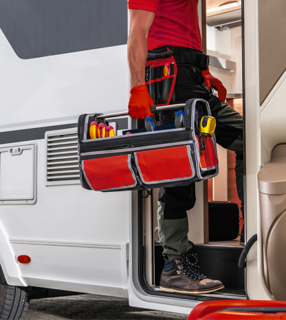 Repairman standing in doorway of motorhome